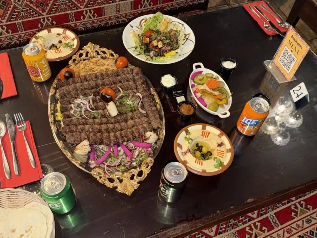 Best King Kabab platter with grilled kebabs, fresh salad, pickles and dips
